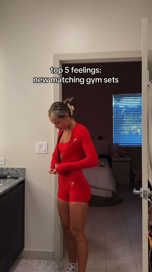 Trying on a new red matching gym set